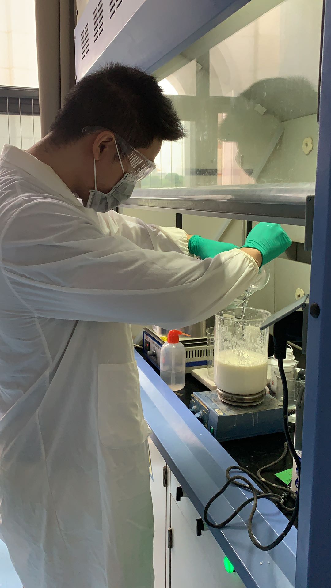 Robert working with materials in a laboratory